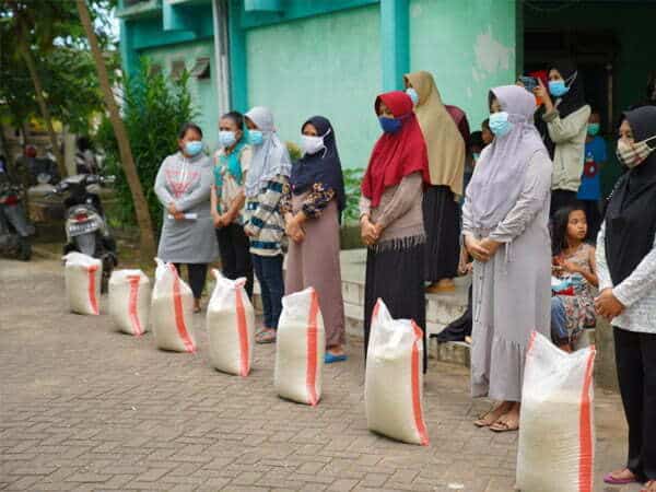 82 KK Warga Rusunawa Terima Bantuan Beras
